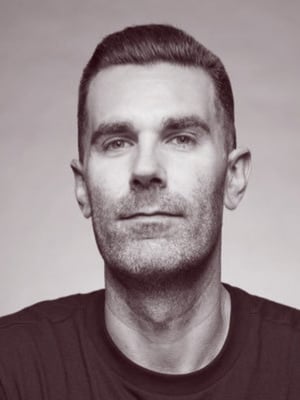 Ari Bouius headshot black and white